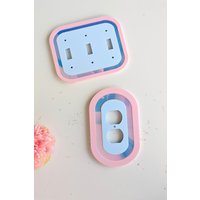 Ovale Irisierende Lichtschalter-Abdeckung Ovale Irisierende Lichtschalter-Abdeckung von AALVO