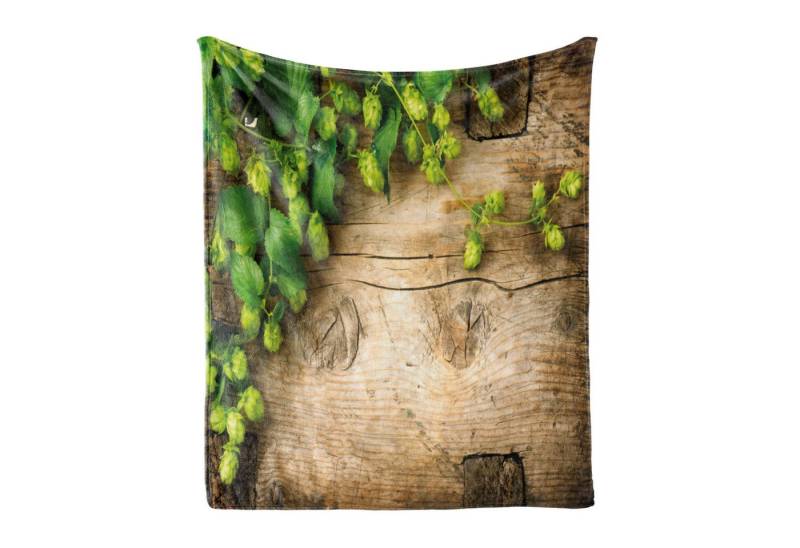 Wohndecke Gemütlicher Plüsch für den Innen- und Außenbereich, Abakuhaus, Pflanze Hop Reisig auf Holz von Abakuhaus