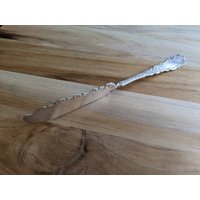 Antike Wm Rogers & Sohn 1894 Florida Twisted Henkel Meister Buttermesser 7 1/4" von AmazingSilver21