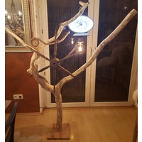 stehlampe Holz Aus Baumast Zeitwende "Spinnrad Der Zeit" stehlampe Holz Aus Baumast Zeitwende "Spinnrad Der Zeit" von AnderstARTig