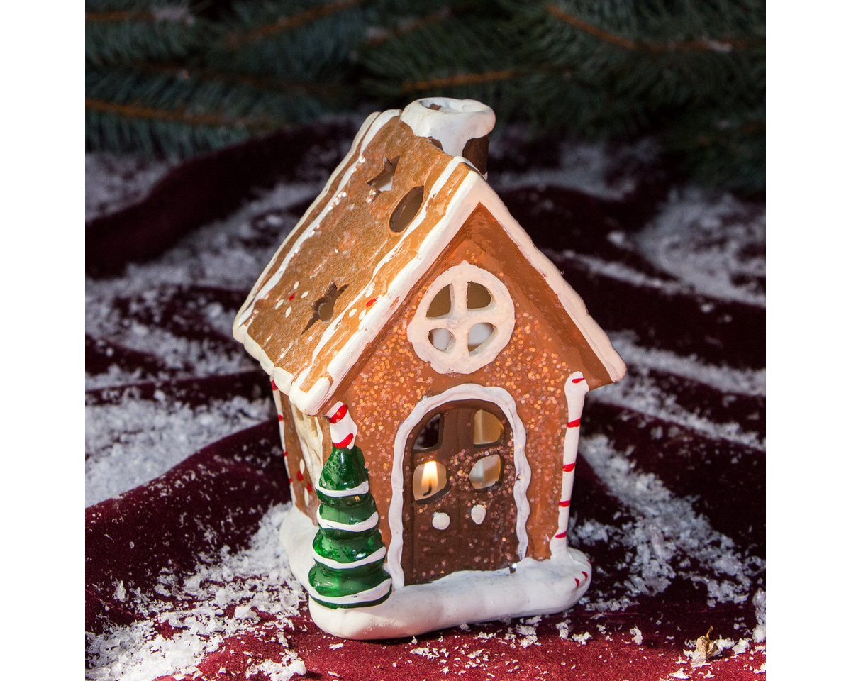 Antikas Weihnachtsfigur Pfefferkuchenhaus als Teelichthalter, hübsches Windlicht aus Porzellan Antikas Weihnachtsfigur Pfefferkuchenhaus als Teelichthalter, hübsches Windlicht aus Porzellan von Antikas