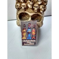 La Santa Muerte Ciega, Sorda Y Clay Laminierte Gebetskarte von Antojitosdesuerte