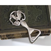 Versilberter Flaschenöffner Mit Hahn-Dekor Versilberter Flaschenöffner Mit Hahn-Dekor von ArmoireAncienne