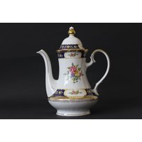 Feine Goldene Kaffeekanne Mit Blumenmuster Und Goldenem Akzent Aus Porzellan Von Winterling von Artifex736