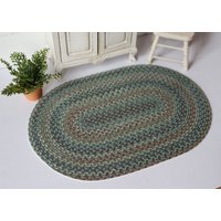 Miniatur Blauer Geflochtener Teppich. Große Größe von Artistique