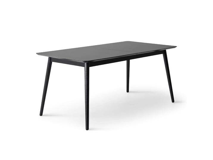 Esstisch HAMMEL FURNITURE Meza Designtisch mit Auszugsfunktion und 2 Einlegeplatten , schwarz (schwarz, schwarz, schwarz), B:165cm H:74cm T:90cm, Tischplatte: Schwarzes nanobehandeltes Fenix-Laminat (schwarzer Rand), Gestell: Massive Esche. Mit nanobehandeltem Laminat, einer matten, seidigen Oberfläche, die Fingerabdrücke abweist und langlebig und hygienisch ist., Tische, abgerundete Tischplatte MDF, Massivholzgestell, in zwei Breite von BAUR