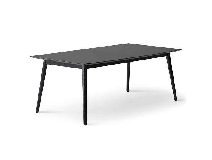 Esstisch HAMMEL FURNITURE Meza Designtisch mit Auszugsfunktion und 2 Einlegeplatten , schwarz (schwarz, schwarz, schwarz), B:210cm H:74cm T:100cm, Tischplatte: Schwarzes nanobehandeltes Fenix-Laminat (schwarzer Rand), Gestell: Massive Esche. Mit nanobehandeltem Laminat, einer matten, seidigen Oberfläche, die Fingerabdrücke abweist und langlebig und hygienisch ist., Tische, bootsförmige Tischplatte MDF, Massivholzgestell, in zwei Breiten von BAUR