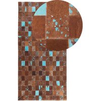 Beliani - Teppich Braun mit Blau 80 x 150 cm aus Leder Patchwork Handgefertigt Rechteckig Modern von BELIANI