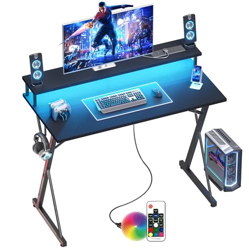 BEXEVUE Gaming Schreibtisch mit Steckdosenleiste LED – 120x50 cm Ergonomic Computer Gamer Tisch, Großer PC Monitorständer, Moderner X Rahmen, Kopfhörerhaken, Studium Arbeit Zuhause Schlafzimmer von BEXEVUE