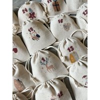 Adventskalender Und/Oder Aufbewahrungsbeutel 24 Zeitlose, Traditionelle Und Zauberhafte Countdown-Beutel Für Weihnachten Im Dezember Adventskalender Und/Oder Aufbewahrungsbeutel 24 Zeitlose, Traditionelle Und Zauberhafte Countdown-Beutel Für Weihnachten Im Dezember von Banasah