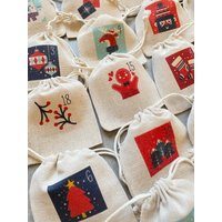 Adventskalender Und/Oder Aufbewahrungsbeutel 24 Zeitlose, Traditionelle Und Zauberhafte Countdown-Beutel Für Weihnachten Im Dezember Adventskalender Und/Oder Aufbewahrungsbeutel 24 Zeitlose, Traditionelle Und Zauberhafte Countdown-Beutel Für Weihnachten Im Dezember von Banasah