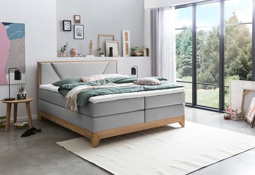 Belanoti Riviera Boxspringbett 180x200 Eiche 7-Zonen Taschenfederkern Matratze inkl Visco Topper Bett 180x200 in der Farbe Hellgrau H2/H3 Polsterbett Hotelbett mit Massivholz Eiche Massivholzbett von Belanoti