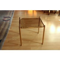 Space Age - Schöner Beistelltisch Messing Aus Den 1970Ern Mit Rauchglasplatte Vintage, Mid Century Brass Side Table With Smoked Glass Plate Space Age - Schöner Beistelltisch Messing Aus Den 1970Ern Mit Rauchglasplatte Vintage, Mid Century Brass Side Table With Smoked Glass Plate von BensGermanVintage