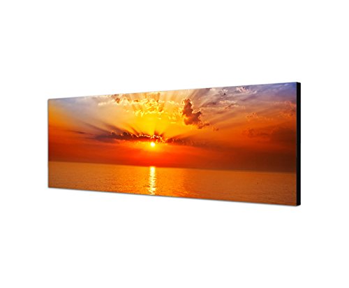 Wandbild auf Leinwand ( Leinwandbild ) als Panorama in 120x40 cm Wunderschöner Sonnenuntergang am Meer mit tollen warmen rötlichen Farben, Wolken Sonnenaufgang. Sonne spiegelt sich im Wasser! von Best for Home