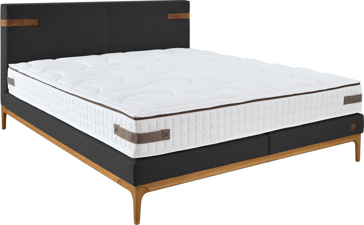 Birkenstock Boxspringbett Iona, mit Lederlaschen am Kopfteil, mit Holzsockel in Eiche natur Birkenstock Boxspringbett Iona, mit Lederlaschen am Kopfteil, mit Holzsockel in Eiche natur von Birkenstock