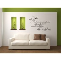 Life Isn't About Waiting For The Storm To Pass It Es Learning Dance in Rain Vinyl Wandaufkleber - Home Spruch von BlueDesignCo