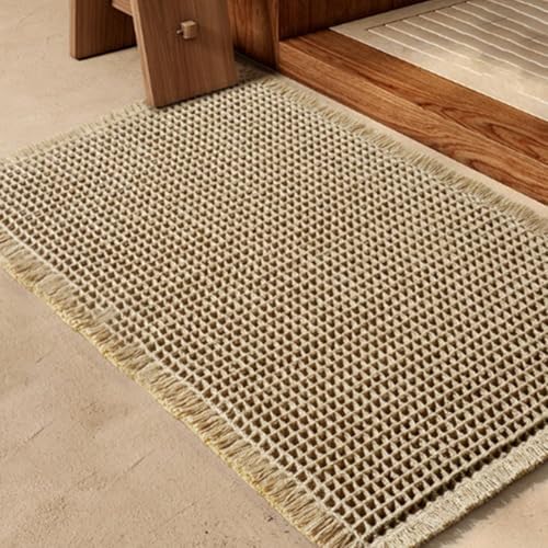 Rutschfester, weicher Badezimmerteppich: waschbare Badematte, schnell trocknend und stilvoll mit Quasten. (C) von CARMOTTER