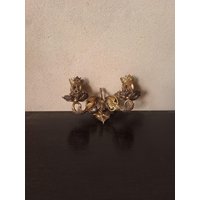 Ein Kleines Paar Verbundene Filigrane Detailreiche Wand-Kerzenhalter Aus Messingblech Bronzeblech von CEsourced
