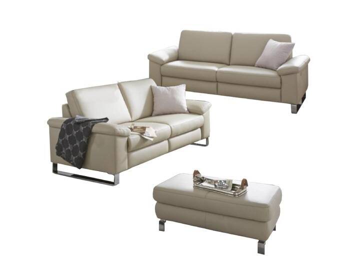 Candy Coast Plus 2.0 Einzelsofas im Rundumbezug mit passendem Hocker in vielen Stoffbezügen oder Echtlederbezügen verschiedene Sitzqualitäten wählbar von Candy-Polstermöbel