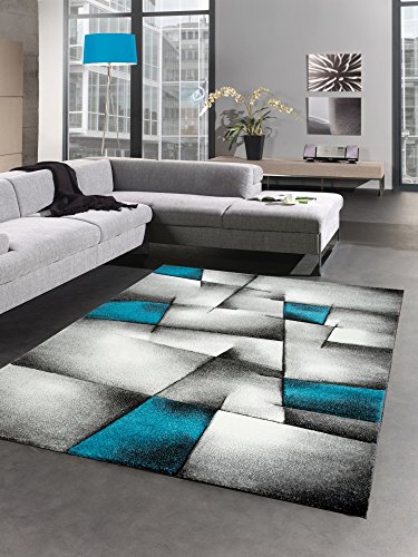 Moderner Teppich Kurzflor Wohnzimmerteppich Konturenschnitt karo abstrakt grau schwarz weiss türkis Größe 80x150 cm von CARPETIA