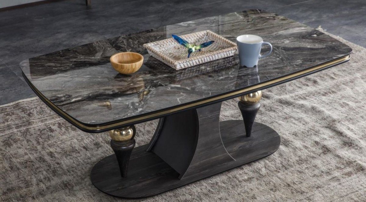 Casa Padrino Couchtisch Luxus Art Deco Couchtisch Schwarz / Grau / Messingfarben 120 x 70 x H. 46 cm - Rechteckiger Wohnzimmertisch mit Glasplatte in Marmoroptik - Möbel von Casa Padrino