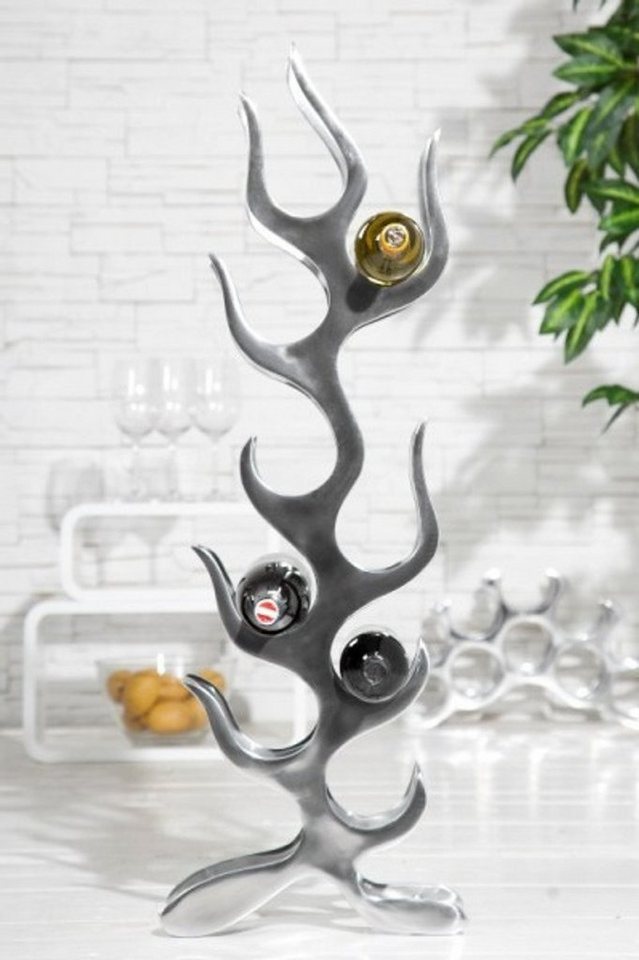 Casa Padrino Dekoobjekt Designer Weinregal für 9 Flaschen poliertes Aluminium Höhe: 93 cm, Breite: 27 cm, Tiefe: 14 cm - Flaschenhalter, Flaschenablage Flammen Flames von Casa Padrino