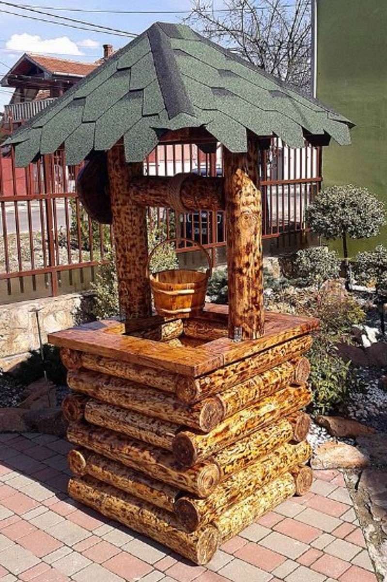 Casa Padrino Garten Brunnen Rustikal mit Schöpfeimer Mod G2 - Eiche Massivholz - Gartenbrunnen Echtholz Massiv Casa Padrino Garten Brunnen Rustikal mit Schöpfeimer Mod G2 - Eiche Massivholz - Gartenbrunnen Echtholz Massiv von Casa Padrino