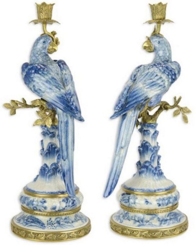 Casa Padrino Kerzenhalter Casa Padrino Jugendstil Kerzenhalter Set Papageien Blau / Weiß / Gold 22,1 x 18,6 x H. 49,4 cm - Porzellan Kerzenständer - Hotel & Restaurant Accessoires - Barock & Jugendstil Deko Accessoires Casa Padrino Kerzenhalter Casa Padrino Jugendstil Kerzenhalter Set Papageien Blau / Weiß / Gold 22,1 x 18,6 x H. 49,4 cm - Porzellan Kerzenständer - Hotel & Restaurant Accessoires - Barock & Jugendstil Deko Accessoires von Casa Padrino
