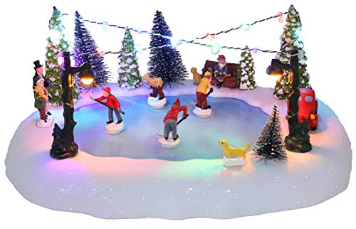 Christmas Concepts® 30 cm batteriebetriebene Musik-LED-Eisbahn-Dorf-Szene – spielt 8 Weihnachtsmelodien von Christmas Concepts