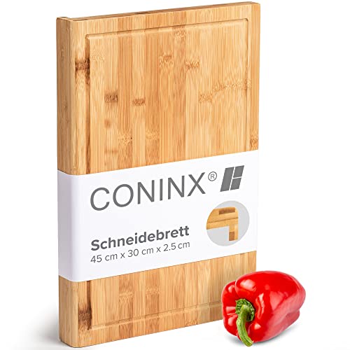 Coninx Schneidebrett Holz groß mit Saftrille - Antibakterielles Moso Bambus Holzbrett zum Schneiden von Gemüse, Obst, Käse, Fleisch & mehr - Robustes Holz Küchenbrett - Servierbrett 45x30x2.5cm von Coninx