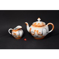 Teekanne & Milchkännchen Aus Porzellan Mit Spritzdekor in Orange-Grau/Art Déco 40Er Teegeschirr Vintage Irisierend von CreativeMacroArt