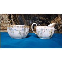 Vintage Handbemaltes Offenes Zucker- Und Milchkännchen-Set - Badewannen-stil Blaue Gelbe Blumen Auf Rosa Hintergrund Goldrand von CrystalAndKitsch
