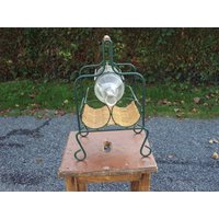 Sehr Schöner Flaschenhalter Aus Metall Und Korbgeflecht Den 1970Er Jahren, Gefunden in Frankreich von DECOETCOLLECTION