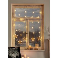 Dekoleidenschaft - led Lichtervorhang Sternenreigen, Lichterkette mit 30 Sternen, Fensterdeko, Weihnachtsbeleuchtung von DEKOLEIDENSCHAFT