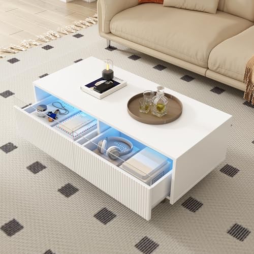 Dieser moderne LED-Couchtisch verfügt über eine gewellte Schubladenplatte, gold-weiße Beine,zwei Schubladen und einen farbwechselnden LED-Lichtstreifen.Ein passender TV-Schrank ist ebenfalls erhältl von DUlVBPE