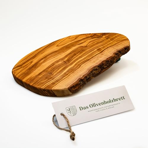 DAS OLIVENHOLZBRETT® Schneidebrett Olivenholz, / Frühstücksbrett aus Olivenholz/Brotzeitbrett aus Holz, der naturbelassene Rand ist meistens mit ein wenig Rinde, kann aber auch ohne sein, 25 cm von das Olivenholzbrett