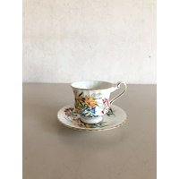 Paragon China Feiner Knochen - Tasse Und Untertasse Porzellan Made in England Blumendekor Mit Goldenem Rand Paragon China Feiner Knochen - Tasse Und Untertasse Porzellan Made in England Blumendekor Mit Goldenem Rand von DeGroteVerzamelaar
