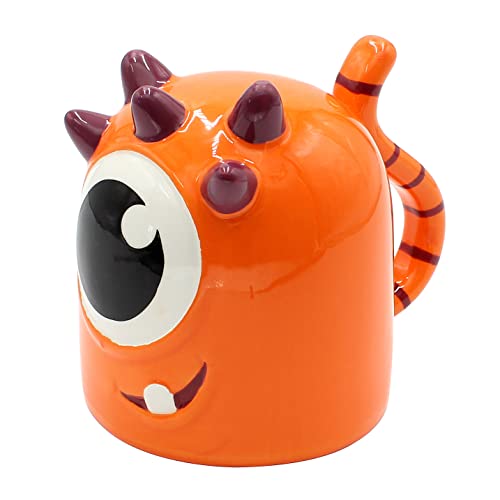 Dekohelden24 Kaffeebecher Kaffeetasse auf Kopf Motiv: Oranges Monster Größe H/Ø: 12 x 9 cm Fassungsvermögen 570ml von Dekohelden24