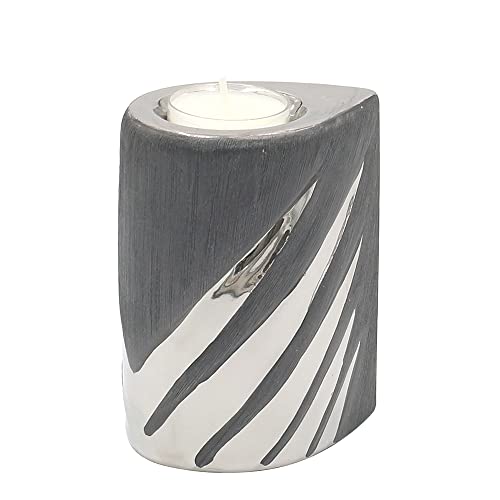 Edler moderner Deko Designer Keramik Teelichthalter in Silber-grau, Maße L/B/H ca. 7 x 9 x 11 cm. Edler moderner Deko Designer Keramik Teelichthalter in Silber-grau, Maße L/B/H ca. 7 x 9 x 11 cm. von Dekohelden24
