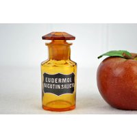 Antike Apothekerflasche 1900 Eudermol Nicotin Emaille Glas Flasche Facettiert Geschliffen Apotheke Laborflasche Vintage Gefäß Deko von DesignVintageShopDE
