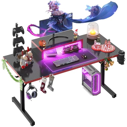 Devoko 140×60cm Gaming Tisch mit LED,Gaming Schreibtisch mit Monitorständer, Kohlefaserbeschichtung T-Rahmen-Design,Ergonomischer Computertisch mit Tassenhalter und Kopfhörerhaken, Schwarz von Devoko