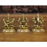 Messing Maa Saraswati Lakshmi Und Ganesha Combo Sitzend Auf Einer Lotus-Plattform. Tempelidolen von DharmaStatues