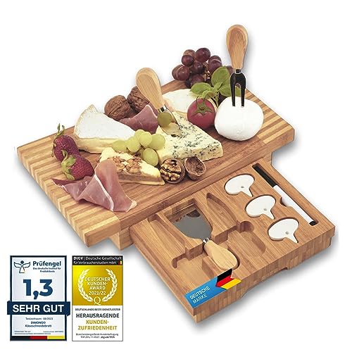 Dimono® XXL Käsebrett Deluxe mit 3 Käse-Messern; 8-teiliges Käse-Schneidebrett Set aus Bambus-Holz mit Käsebesteck zum Servieren, Genießen & Erleben von Dimono