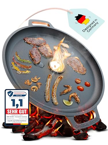 Feuerplatte aus Gusseisen mit Tropfschutz. Ø35cm. Grillplatte Plancha ideal für Raketenofen u.v.m. Outdoor BBQ-Platte mit Tragegriff. Grill Zubehör. Gusseisenpfanne. Stärke 5mm Loch Ø4cm Drei Eichen von Drei Eichen