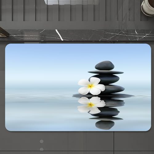 EMCLKS Badteppich rutschfeste,weicher Badezimmerteppich Badematte Badvorleger für Dusche,Badewanne und Toilette,EIN instabiler schwarzer Stein mit Einer weißen Blume darauf, der Sich im ruh,60x90 cm von EMCLKS