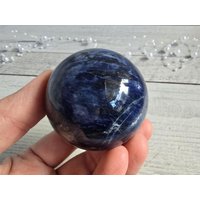 Sodalith Kugel 51mm 178G #1 Sodalith Kugel 51mm 178G #1 von EdelsteinchenWelt
