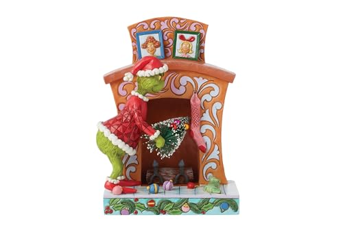 The Grinch by Jim Shore Grinch Pushing Tree Up Fireplace Figurine von Enesco