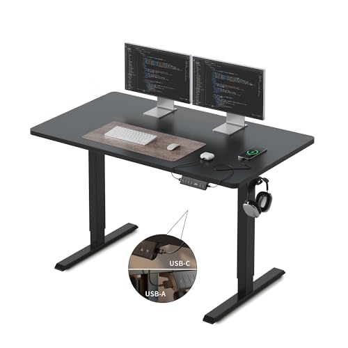 FEZIBO Höhenverstellbarer Schreibtisch EINTEILIGER Tischplatte, 100 x 60 cm Schreibtisch Höhenverstellbar mit USB-A und USB-C-Ladeanschlüssen, Steh-Sitz Tisch für Heimbüro, Standing Desk, Schwarz von FEZIBO