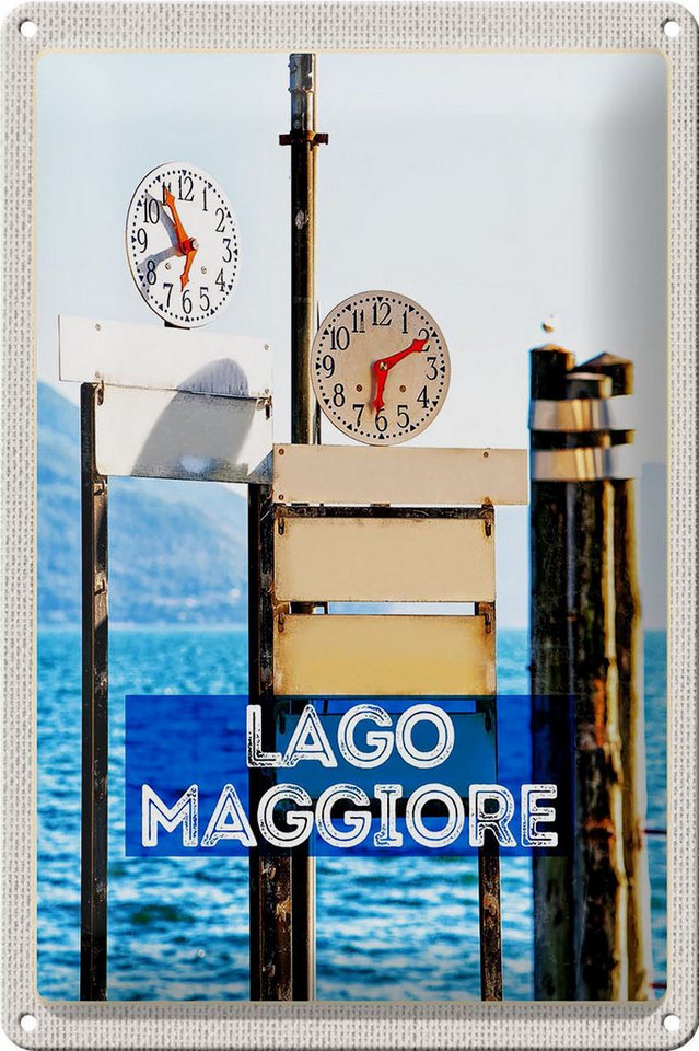 Femer GmbH Metallschild Reise 20x30cm Lago Maggiore Uhr Zeit Meer Gebirge, (1 St), gewölbte Oberfläche, abgerundete Ecken, umgeschlagene Kanten von Femer GmbH