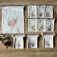 Weihnachtskalender Aus 24 Säckchen Mit Wintermotiv Zum Selbst Befüllen Inkl. Personalisierbaren Geschenkbeutel, Adventskalender von FraeuleinFred